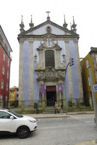 The parish church of Sao Nicolau in Porto has a banner for Holy Week, but most people in Portugal consider this a time for family togetherness.