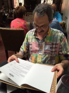 Richard checks out the menu at Cantina 32 in Porto.